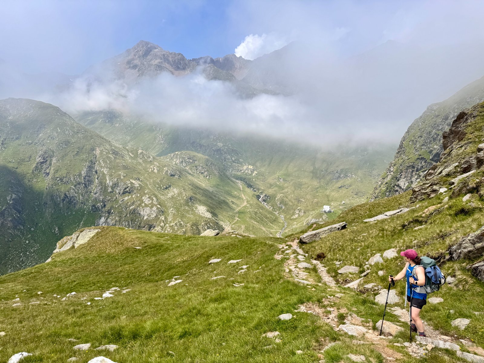 Panoramic view of alpine valley with mountain lakes and rocky peaks in the Pyrenees